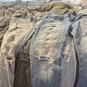Blue Skinny Distressed Jeans with Rips and Vintage Appeal